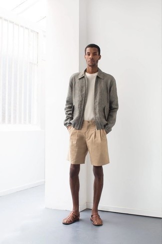 Brown Leather Sandals Outfits For Men: Effortlessly blurring the line between dapper and casual, this combination of a grey harrington jacket and tan shorts will easily become one of your go-tos. Brown leather sandals will give a carefree feel to this getup.