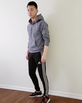 Black Sweatpants Outfits For Men: Wear a grey hoodie with black sweatpants for a laid-back twist on day-to-day combinations. Introduce black athletic shoes to the equation and off you go looking awesome.