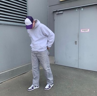 Purple Baseball Cap Outfits For Men: When the setting permits a laid-back outfit, consider wearing a grey hoodie and a purple baseball cap. Violet leather low top sneakers will infuse an added dose of sophistication into an otherwise mostly casual outfit.
