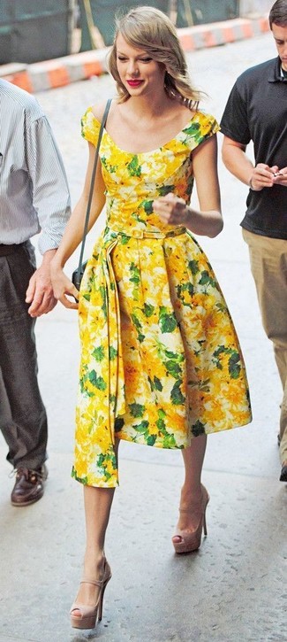 Taylor Swift wearing Grey Leather Crossbody Bag, Beige Leather Heeled Sandals, Yellow Floral Midi Dress