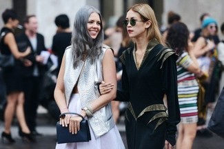 Black and White Leather Clutch Casual Outfits: Dress in a grey leather vest and a black and white leather clutch for a stylish and edgy outfit.