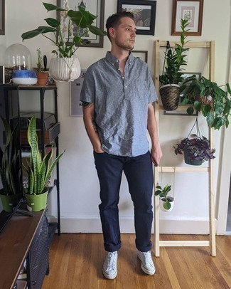 Grey Polo Outfits For Men: If you don't take fashion too seriously, go for casual and cool style in a grey polo and navy jeans. To bring out the fun side of you, add white canvas high top sneakers to the equation.