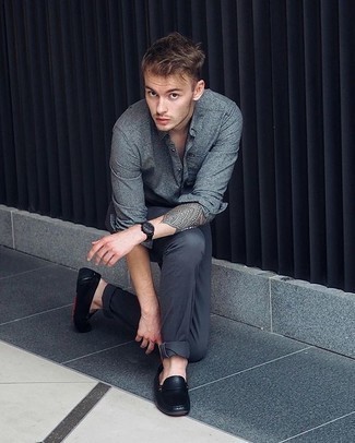 Black Leather Driving Shoes Outfits For Men: Want to inject your menswear collection with some casual cool? Pair a grey long sleeve shirt with charcoal chinos. Let your styling expertise really shine by finishing this getup with a pair of black leather driving shoes.