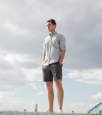 Charcoal Long Sleeve Shirt Outfits For Men: A charcoal long sleeve shirt and charcoal shorts are a wonderful combo worth having in your current collection. A pair of white canvas low top sneakers can integrate wonderfully within a myriad of ensembles.