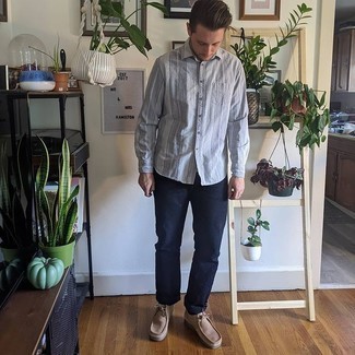 Tan Suede Desert Boots Outfits: This pairing of a grey vertical striped long sleeve shirt and navy jeans is perfect for dress-down days. Here's how to play it up: tan suede desert boots.