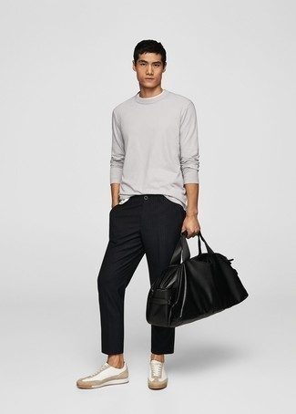 Grey Long Sleeve T-Shirt Outfits For Men: A grey long sleeve t-shirt and black vertical striped chinos are a great look to have in your daily off-duty fashion mix. White leather low top sneakers are the ideal accompaniment for your look.