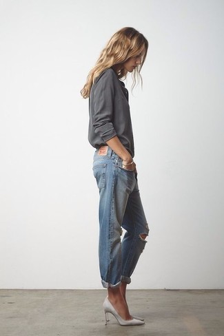 Blue Ripped Jeans Outfits For Women: If you're a fan of relaxed dressing when it comes to your personal style, you'll love this chic pairing of a grey long sleeve t-shirt and blue ripped jeans. You could perhaps get a bit experimental when it comes to shoes and elevate your getup by wearing grey suede pumps.