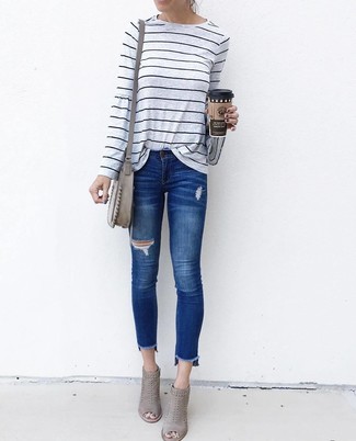 Women's Grey Horizontal Striped Long Sleeve T-shirt, Blue Ripped Skinny Jeans, Grey Cutout Suede Ankle Boots, Grey Suede Crossbody Bag