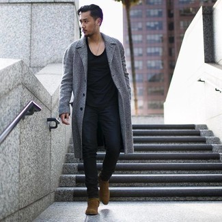 Brown Suede Chelsea Boots Outfits For Men: A grey herringbone overcoat and black skinny jeans make for the ultimate casual style for today's gent. For something more on the smart side to complement your ensemble, complement this ensemble with a pair of brown suede chelsea boots.