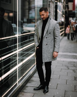 Grey Herringbone Overcoat Outfits: This pairing of a grey herringbone overcoat and black chinos is certainly eye-catching, but it's extremely easy to achieve. Let's make a bit more effort now and throw in black leather chelsea boots.