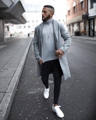 Black Skinny Jeans Outfits For Men: On days when comfort is everything, this pairing of a grey overcoat and black skinny jeans is a no-brainer. Let your sartorial credentials truly shine by rounding off your look with a pair of white canvas low top sneakers.