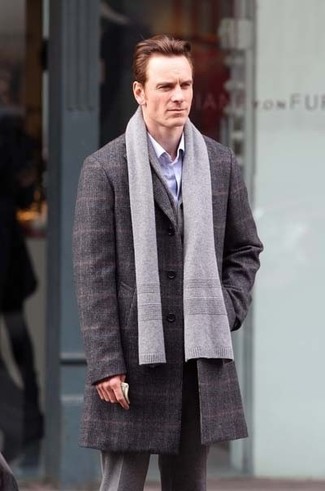 Pair a grey plaid overcoat with grey wool dress pants if you're going for a proper, classic look.