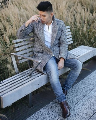 Charcoal Herringbone Overcoat Outfits: This semi-casual pairing of a charcoal herringbone overcoat and blue jeans is very easy to pull together in no time, helping you look stylish and prepared for anything without spending too much time rummaging through your wardrobe. Balance out this look with a dressier kind of footwear, such as these dark brown leather chelsea boots.