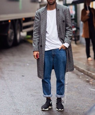 Charcoal Herringbone Overcoat Outfits: Go for refined style in a charcoal herringbone overcoat and blue jeans. Bump up your whole ensemble by rounding off with a pair of black athletic shoes.