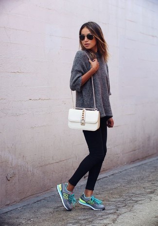 Silver Athletic Shoes Outfits For Women: A grey knit oversized sweater and black skinny jeans are essential items, without which no off-duty sartorial arsenal would be complete. To introduce an air of stylish nonchalance to this outfit, complement your ensemble with a pair of silver athletic shoes.