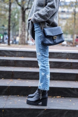 Grey Oversized Sweater Outfits: Putting together a grey oversized sweater with light blue star print jeans is an on-point choice for a laid-back but seriously chic getup. Make this look a bit classier by finishing off with black chunky leather ankle boots.