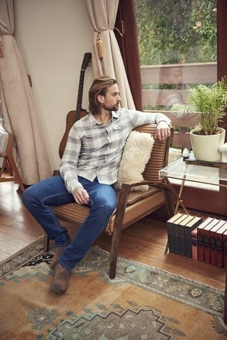 500+ Fall Outfits For Men: A grey plaid long sleeve shirt and navy jeans? This is an easy-to-create outfit that any gent can rock a version of on a daily basis. If you wish to instantly dial up your outfit with a pair of shoes, make dark brown suede chelsea boots your footwear choice. Can you see how super easy it is to look on-trend and stay comfy come chillier weather, thanks to this getup?
