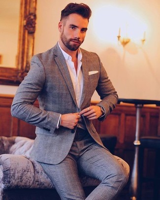 White Dress Shirt Warm Weather Outfits For Men In Their 20s: This pairing of a white dress shirt and a grey plaid suit is really stylish and creates instant appeal. A safe bet getup appropriate for 20-year-olds.
