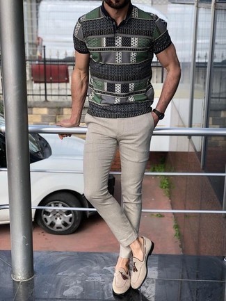 Grey Print Polo Outfits For Men: This casual combo of a grey print polo and beige chinos is a safe bet when you need to look laid-back and cool but have no extra time. To add elegance to your getup, round off with beige suede tassel loafers.