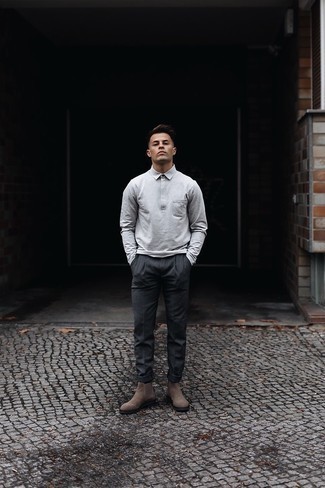 Brown Suede Chelsea Boots Outfits For Men: This combo of a grey polo neck sweater and charcoal chinos is truly sharp and provides instant polish. Brown suede chelsea boots will infuse an added touch of class into an otherwise mostly casual outfit.