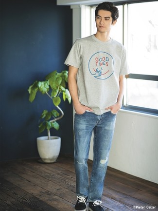 Blue Ripped Jeans Outfits For Men: A grey print crew-neck t-shirt and blue ripped jeans are essential in any gent's great off-duty sartorial collection. To introduce a bit of zing to your ensemble, add navy suede low top sneakers to your ensemble.