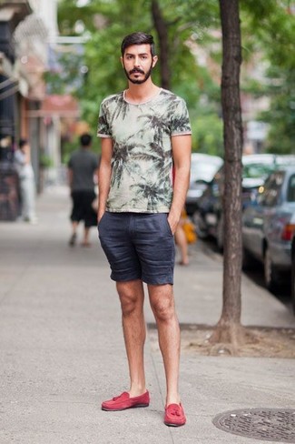 Charcoal Print Crew-neck T-shirt Outfits For Men: If you're obsessed with comfort styling when it comes to fashion, you'll appreciate this casual pairing of a charcoal print crew-neck t-shirt and navy shorts. Our favorite of a variety of ways to finish this look is red suede tassel loafers.