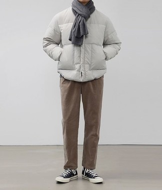 Men's Grey Puffer Jacket, Brown Chinos, Black and White Canvas High Top Sneakers, Charcoal Scarf