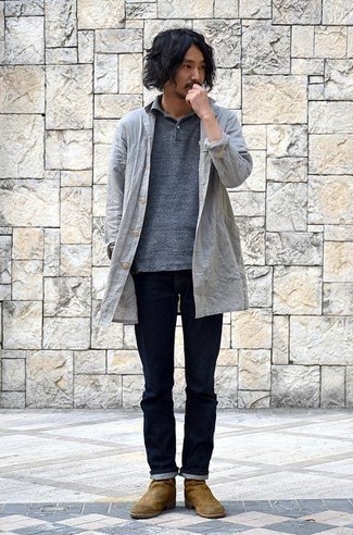 Grey Raincoat Outfits For Men: For functionality without the need to sacrifice on fashion, we turn to this pairing of a grey raincoat and navy jeans. A pair of brown suede chelsea boots immediately boosts the style factor of your look.