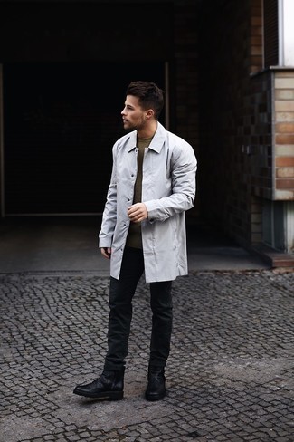 Charcoal Raincoat Outfits For Men: This casual pairing of a charcoal raincoat and black chinos is very easy to put together in no time, helping you look amazing and ready for anything without spending a ton of time combing through your wardrobe. For something more on the elegant end to finish off this look, complement your outfit with a pair of black leather chelsea boots.