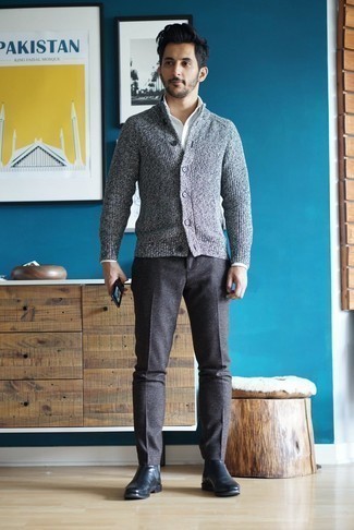 Grey Shawl Cardigan Outfits For Men: This combo of a grey shawl cardigan and charcoal wool chinos will add casually neat essence to your outfit. Complete this ensemble with black leather chelsea boots to easily step up the classy factor of any getup.