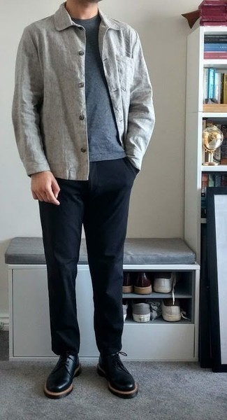 Grey Shirt Jacket Outfits For Men: This combo of a grey shirt jacket and navy chinos looks amazing, but it's very easy to imitate. Let your outfit coordination skills truly shine by complementing your look with black leather desert boots.