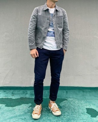 Tobacco Canvas Low Top Sneakers Outfits For Men: Such pieces as a grey shirt jacket and navy chinos are the ideal way to inject some elegance into your casual rotation. To give your ensemble a more laid-back feel, add tobacco canvas low top sneakers.