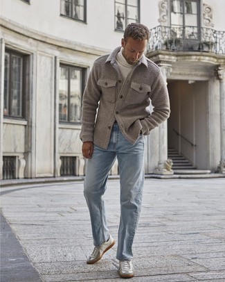 Grey Fleece Shirt Jacket Outfits For Men: If you're looking for a relaxed and at the same time sharp ensemble, try pairing a grey fleece shirt jacket with light blue jeans. Complement your ensemble with a pair of white leather low top sneakers to easily dial up the wow factor of your look.