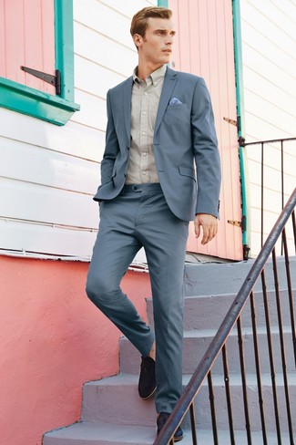 To look like a stylish gentleman, opt for a grey suit and a beige long sleeve shirt. Let your styling chops really shine by finishing off this look with a pair of black suede tassel loafers.