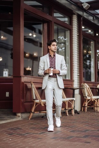 Burgundy Dress Shirt Outfits For Men: Wear a burgundy dress shirt and a grey suit for truly sharp attire. For a more laid-back vibe, why not complete this outfit with a pair of white canvas low top sneakers?