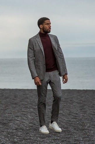 Burgundy Turtleneck with Grey Wool Suit Smart Casual Outfits: For a look that's sophisticated and truly wow-worthy, team a grey wool suit with a burgundy turtleneck. Don't know how to round off? Go for a pair of white canvas low top sneakers to jazz things up.