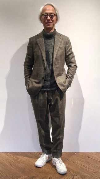Grey Check Suit Outfits: When it comes to timeless classy style, this combination of a grey check suit and a charcoal wool turtleneck is the ultimate style. White athletic shoes will give a fun feel to an otherwise dressy look.