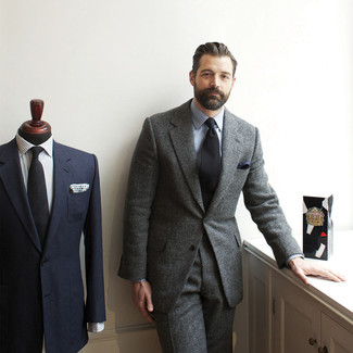 Try teaming a grey wool suit with a light blue dress shirt for manly sophistication with a fashionable spin.