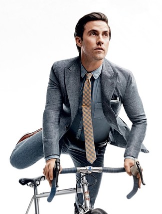 Milo Ventimiglia wearing Grey Suit, Light Blue Chambray Dress Shirt, Brown Leather Oxford Shoes, Yellow Check Tie