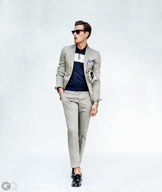 Navy Paisley Pocket Square Outfits: A grey suit and a navy paisley pocket square are amazing menswear essentials that will integrate nicely within your current off-duty routine. And if you want to easily dress up this ensemble with one piece, add a pair of navy leather loafers to the equation.