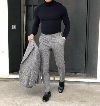 Navy Turtleneck Outfits For Men: You're looking at the solid proof that a navy turtleneck and a grey check wool suit look amazing when teamed together. A nice pair of black leather chelsea boots pulls this ensemble together.