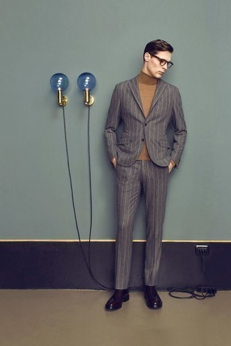 Charcoal Vertical Striped Suit Outfits: You'll be surprised at how very easy it is for any gentleman to get dressed this way. Just a charcoal vertical striped suit and a tan turtleneck. Complete this look with burgundy leather derby shoes to easily amp up the fashion factor of your look.