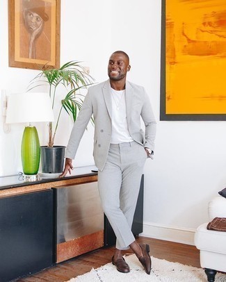 Grey Suit with Loafers Outfits: This combination of a grey suit and a white crew-neck t-shirt is the perfect base for a countless number of ensembles. A pair of loafers effortlessly boosts the fashion factor of any outfit.