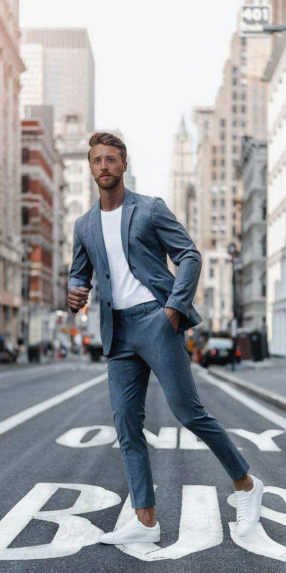 grey suit and white sneakers