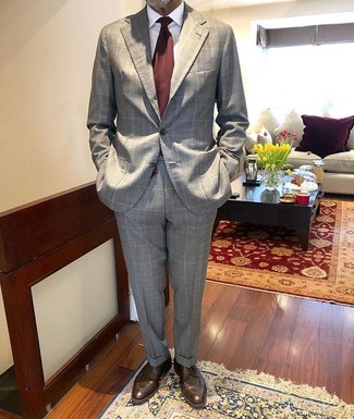 Grey Check Suit Outfits: Opt for a grey check suit and a white dress shirt to look like a modern gent at all times. A pair of dark brown leather derby shoes makes your outfit whole.