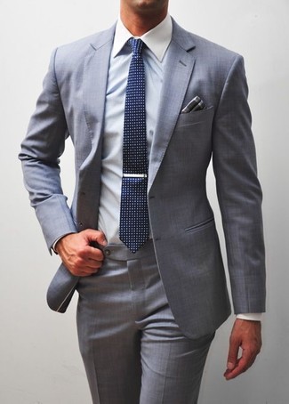 Grey Plaid Pocket Square Outfits: To put together an off-duty look with a modern take, you can dress in a grey suit and a grey plaid pocket square.