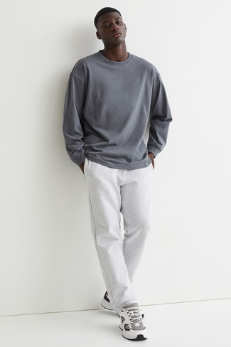 Charcoal Long Sleeve T-Shirt Outfits For Men: For a look that brings functionality and fashion, try teaming a charcoal long sleeve t-shirt with a grey sweatshirt. Put a more casual spin on an otherwise dressy look by sporting grey athletic shoes.