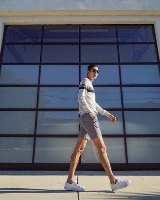 Grey Shorts Outfits For Men: This combo of a grey horizontal striped sweatshirt and grey shorts is solid proof that a safe off-duty look doesn't have to be boring. Complement this ensemble with a pair of white canvas low top sneakers and ta-da: the ensemble is complete.