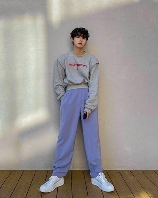 Grey Print Sweatshirt Outfits For Men: Reach for a grey print sweatshirt and light violet chinos for a casual level of dress. As for shoes, grab a pair of white canvas low top sneakers.