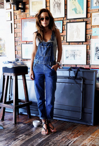 Charcoal Tank Outfits For Women: A charcoal tank and blue denim overalls will add serious cool to your off-duty wardrobe. The whole outfit comes together perfectly if you complement this ensemble with a pair of black leather thong sandals.